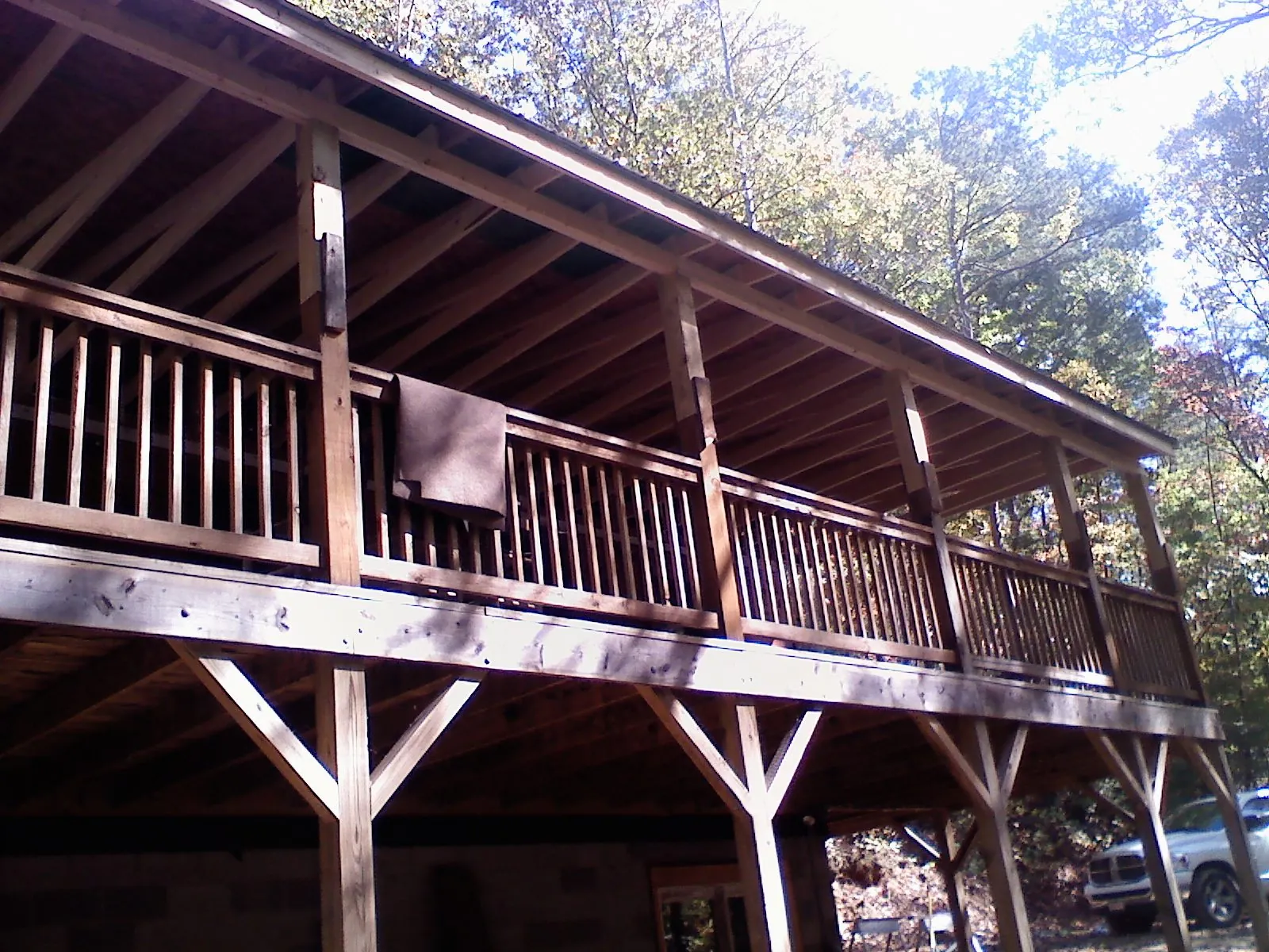 Timber framing under a new elevated porch and deck — Roof Leak Repair in Lemoore by Roofing Brothers